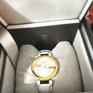Gucci Women's Gold and White Timepiece
